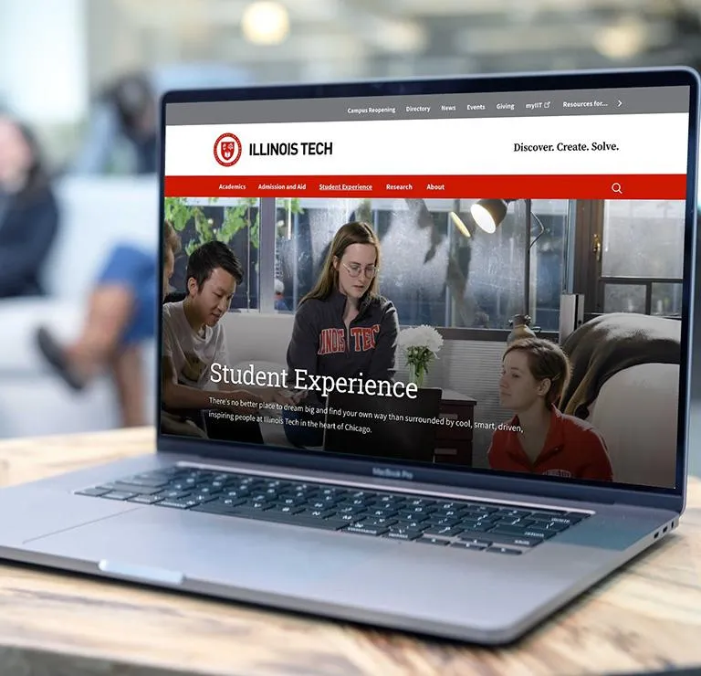 The Illinois Tech student experience page displayed on a laptop