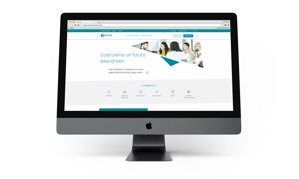 The Cerved homepage on a desktop screen with audience navigation for businesses, banks and public administration
