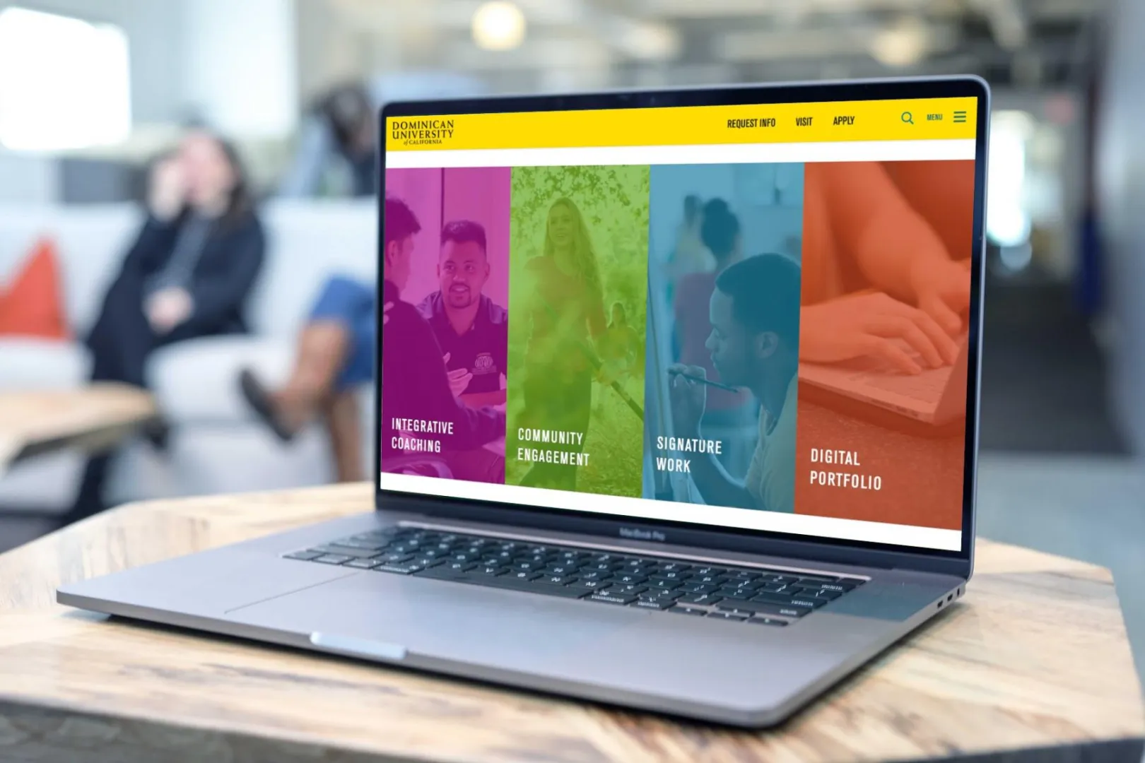The Dominican University of California website displayed on a laptop