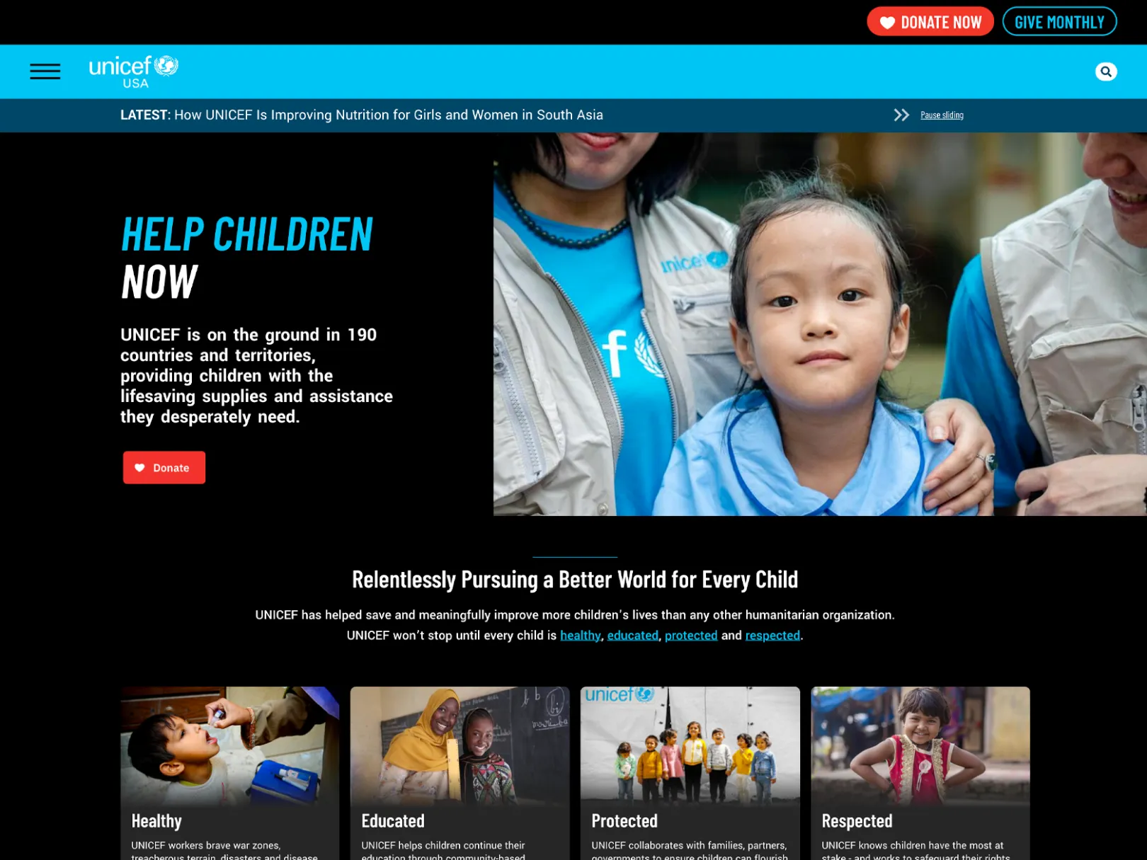 UNICEF USA Homepage with dark background, features picture of children