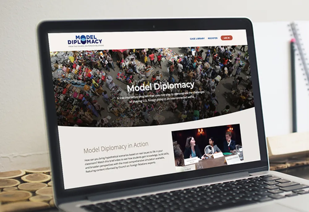 Model Diplomacy homepage on a laptop