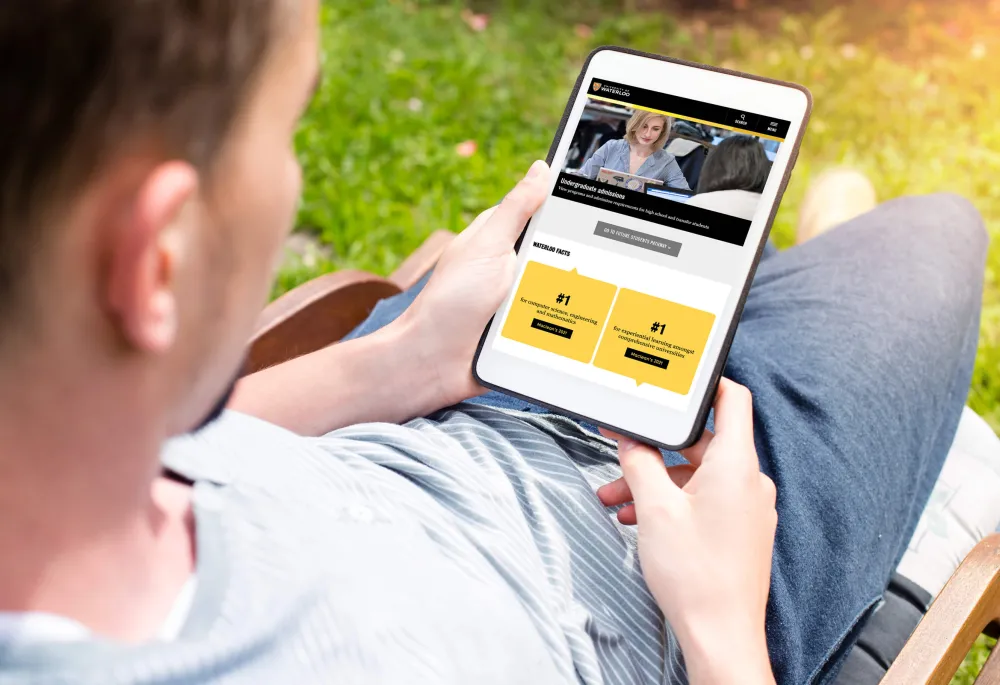 The University of Waterloo's website viewed by a person on their iPad 