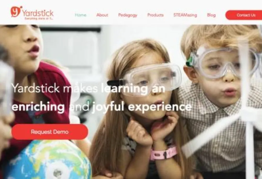 yardstick LMS homepage with an image of students looking at an experiement