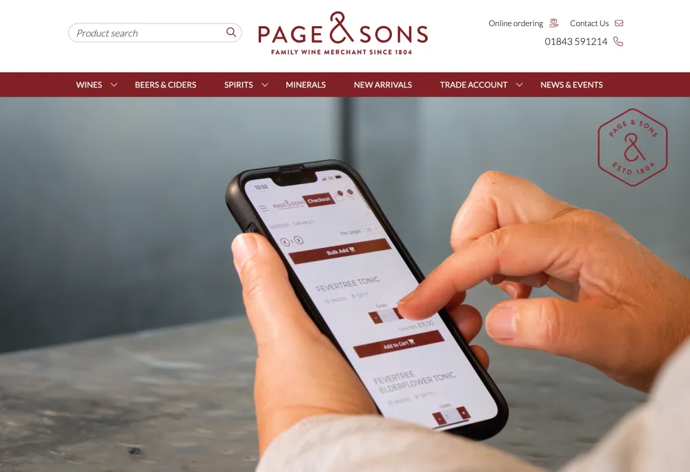 a website homepage with an image of Human hand making an order on a mobile 