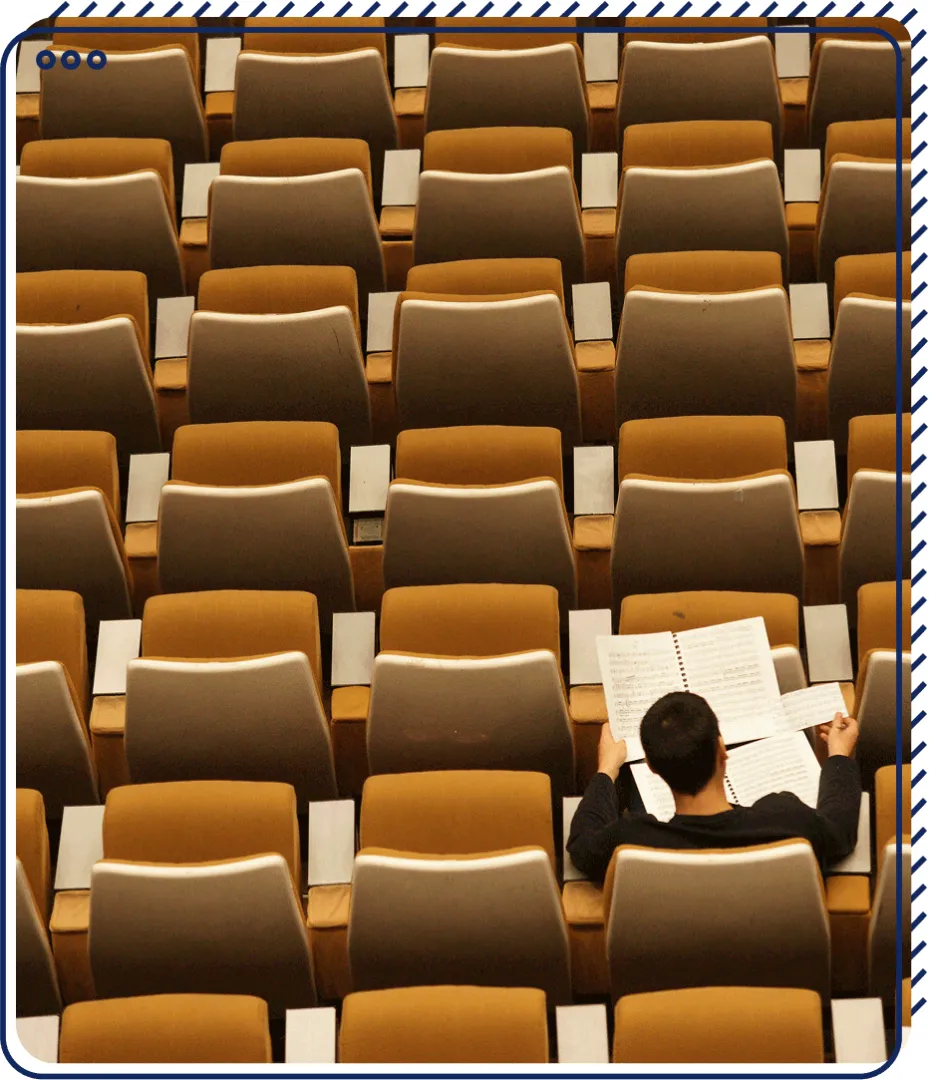 solo student in a higher ed lecture hall