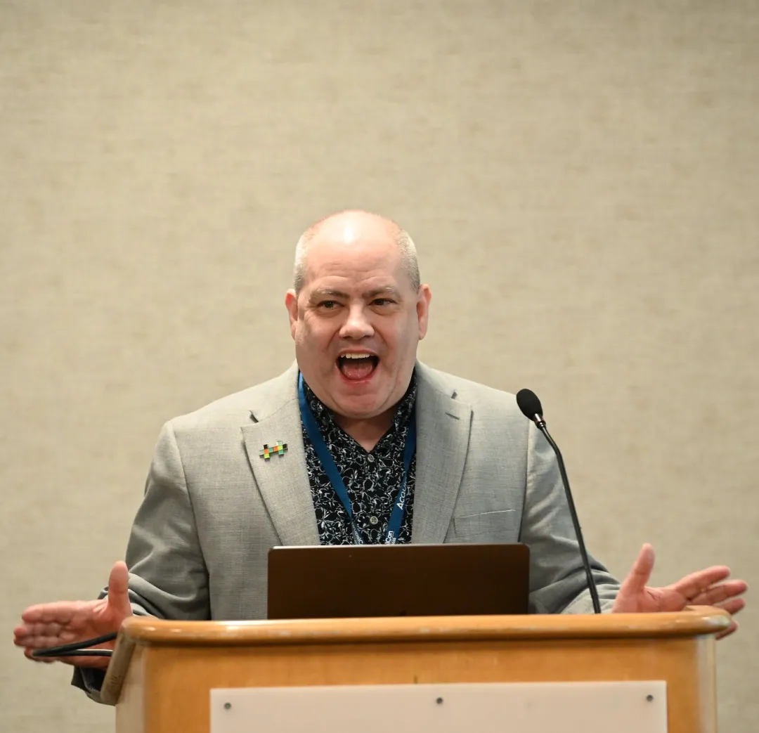 Matthew Saunders Speaking - Middle Aged Man in Sport Coat