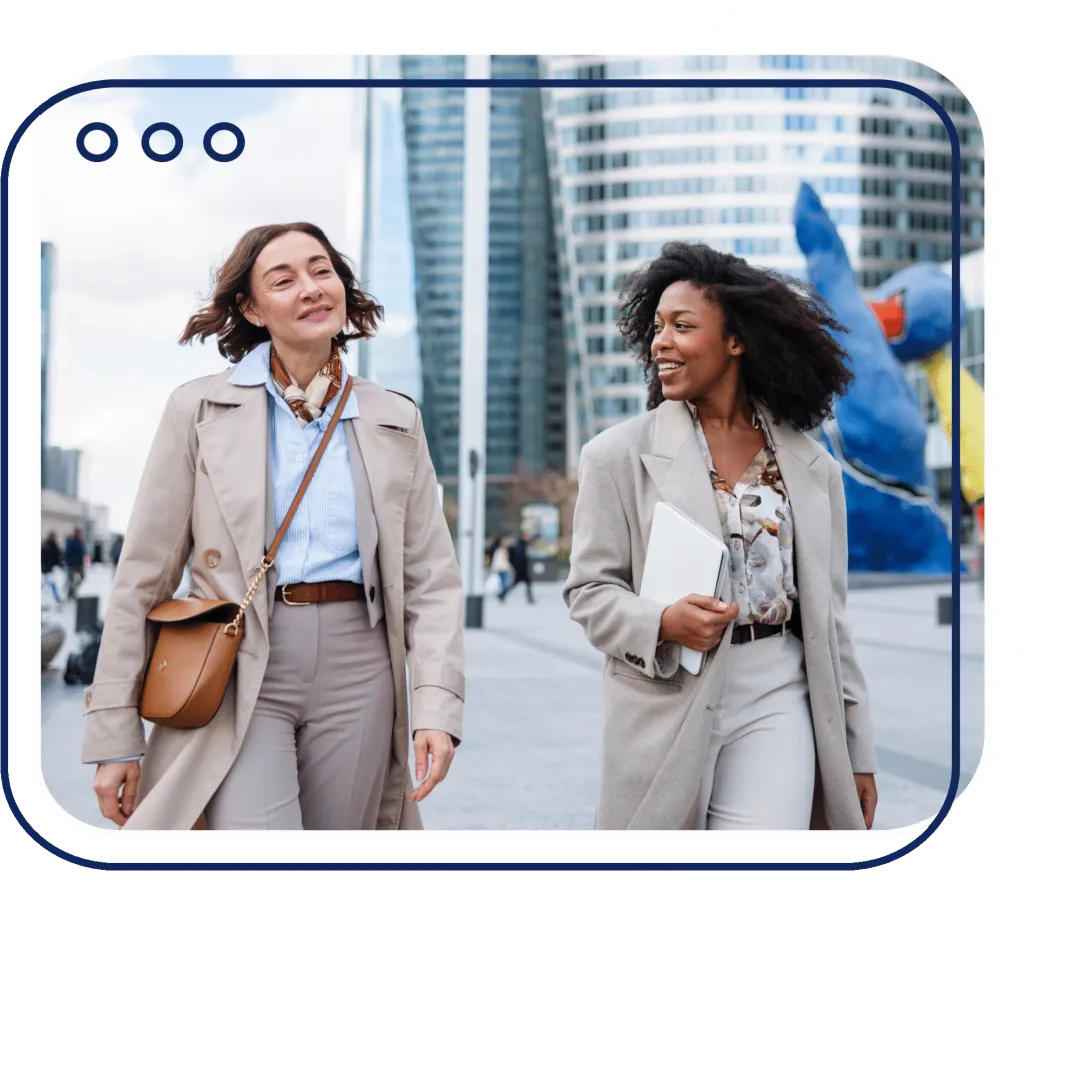 Two business women outside the venue in Paris