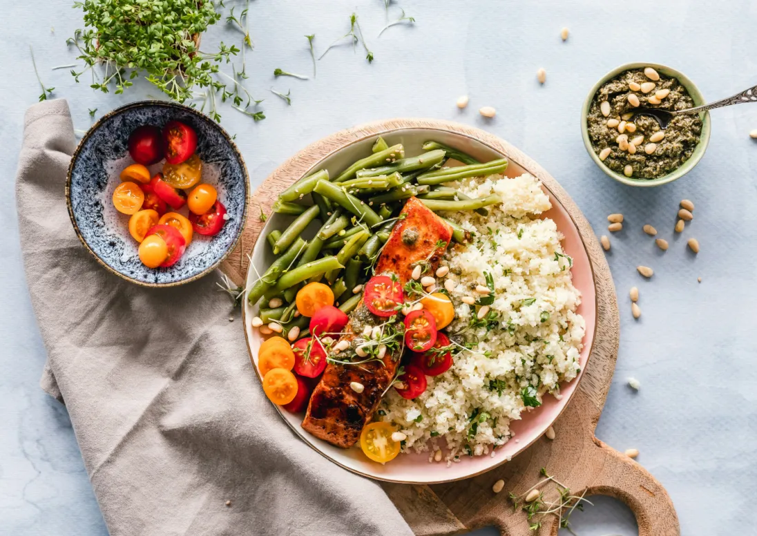 A bowl of food on a bench