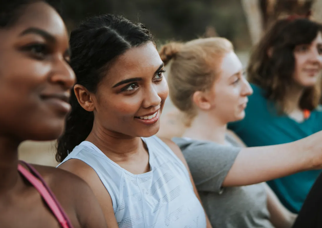 Four women standing in a line