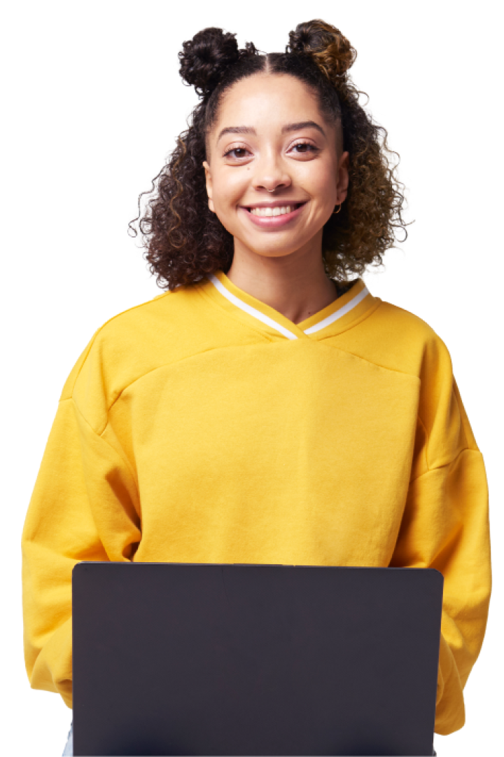 Smiling woman in yellow jumper working on her laptop