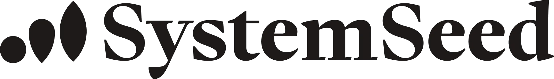 Logo with the word SystemSeed in black text and three increasing symbols on the left that look like a seed, a drop, and a leaf.