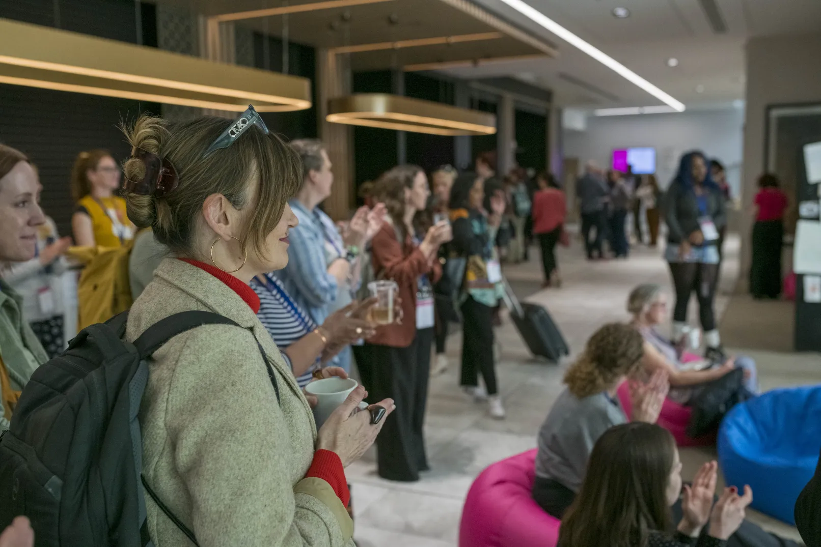 Delegates applauding during an NCCPE Engage Summit session